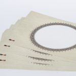 Round-shaped ornamented coated paper